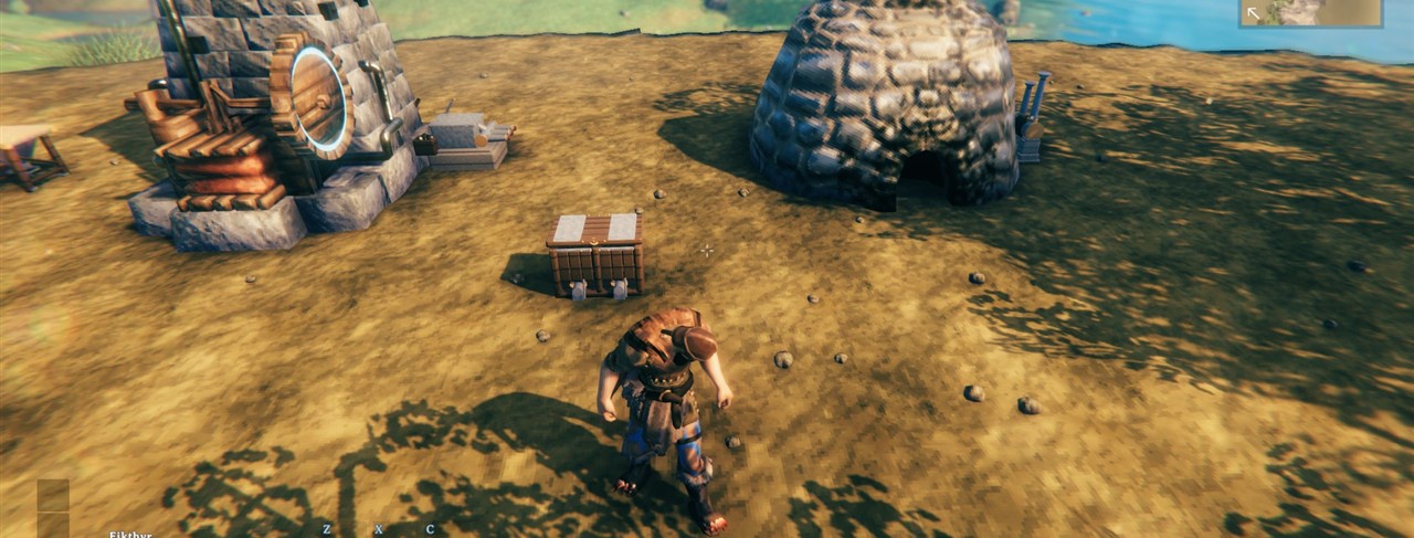 A Stoker's Chest standing between a smelter and a charcoal kiln
