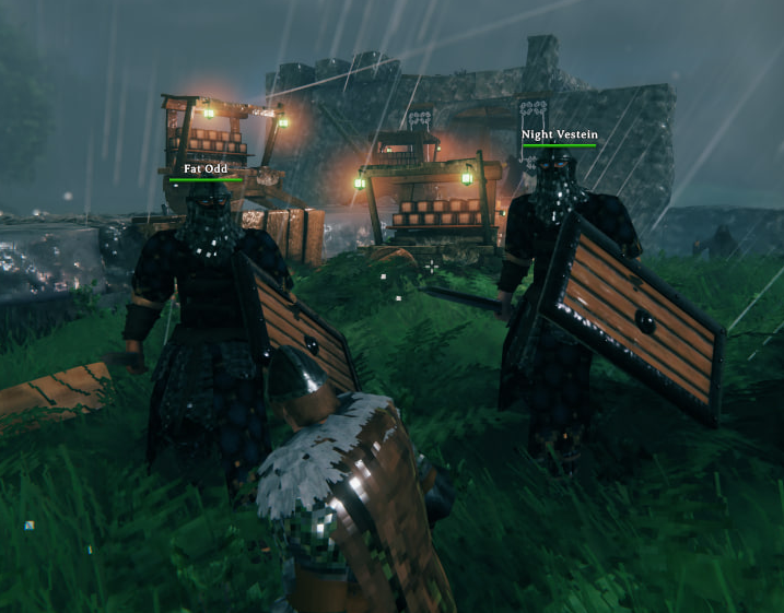 Hired guards standing watch in the rain