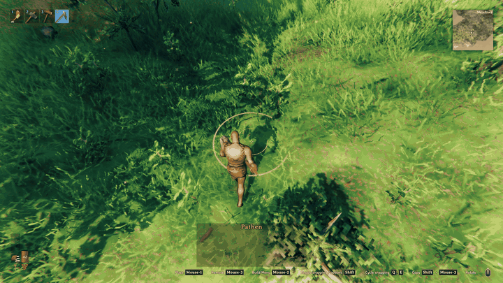 A road being paved in the forest, then the map opening to show the same road already drawn as map ink